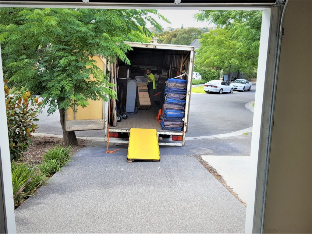 Moving furniture outer western suburbs truck unloading.